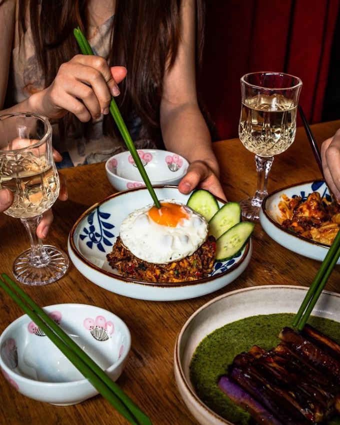 Fried rice with a fried egg and cucumber at Noodle and Beer restaurant.